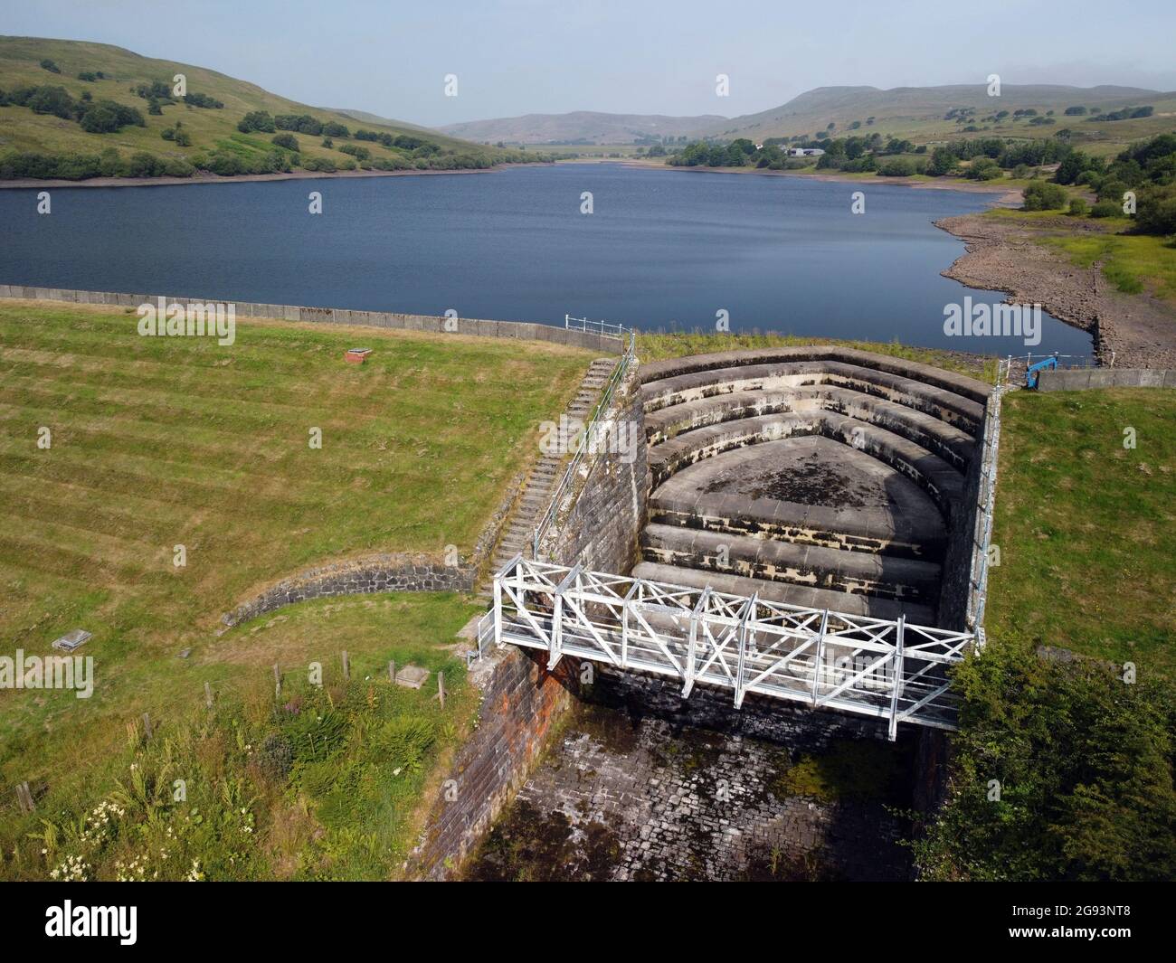 Unusually hot weather causes water levels to fall at Camphill reservoir, North Ayrshire, Scotland, the source for almost all of the areas fresh water. Stock Photo