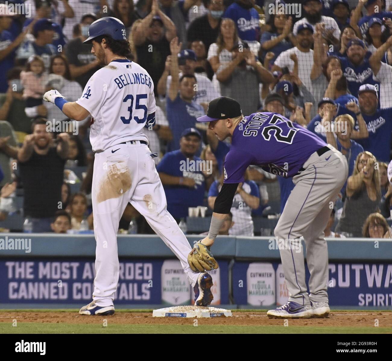 Los Angeles, USA. 24th July, 2021. Los Angeles Dodgers' Cody Bellinger is  safe at third after driving an 0-and-2 fastball from Colorado Rockies left-hander  Ben Bowden off the right-center-field wall for a