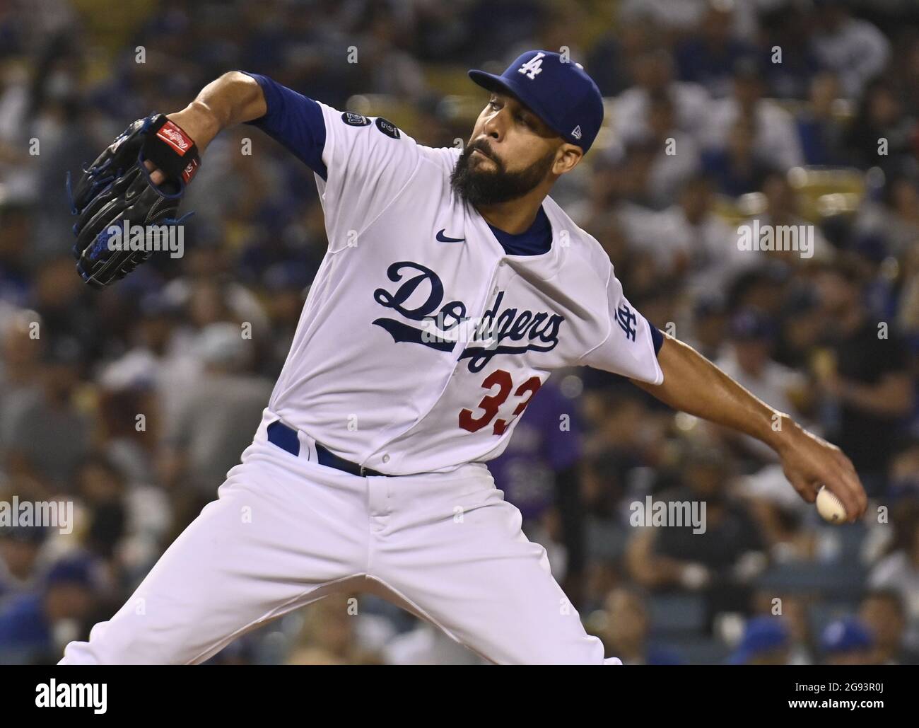 Los Angeles, USA. 24th July, 2021. Los Angeles Dodgers' starting pitcher David Price winds up to deliver against the Colorado Rockies at Dodger Stadium in Los Angeles on Friday, July 23, 2021. The Rockies defeated the Dodgers 9-6, It was the Dodgers' third straight game in which the bullpen could not hold a late lead. Photo by Jim Ruymen/UPI Credit: UPI/Alamy Live News Stock Photo