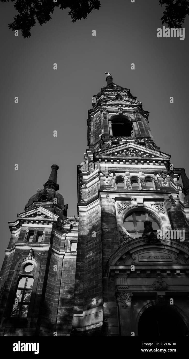 Vertical grayscale shot of a gothic church exterior Stock Photo - Alamy