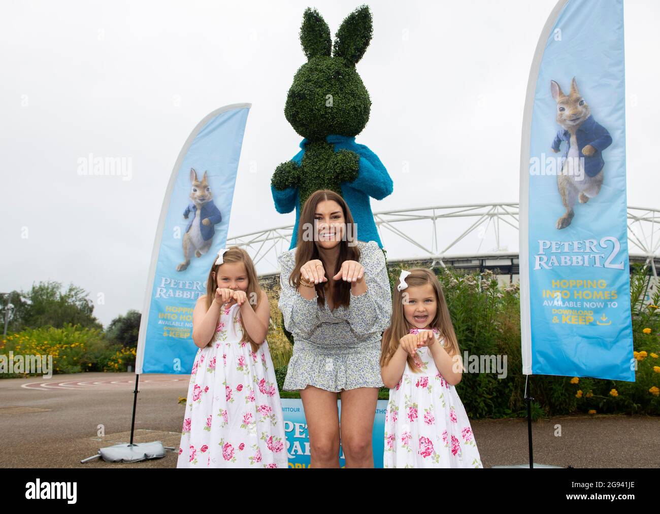 EDITORIAL USE ONLY Imogen Thomas and her daughters Ariana, age 8, and