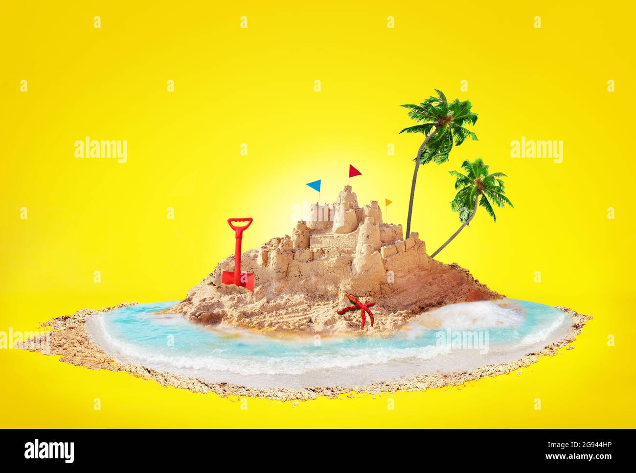 Summer concept sand island and sandcastle on beach Stock Photo