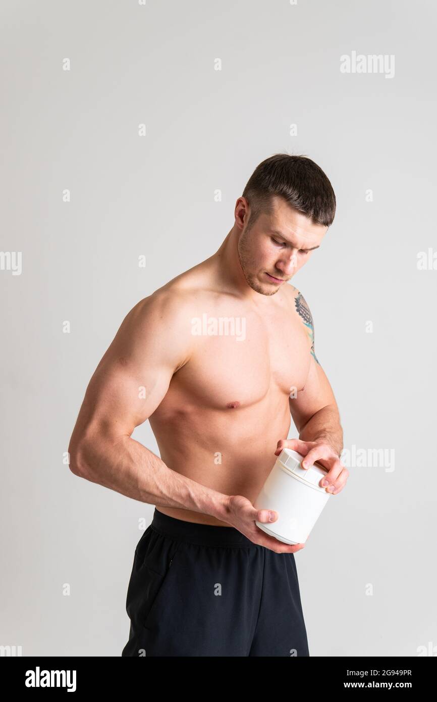 Fitness protein jars white on white background bodybuilder powder