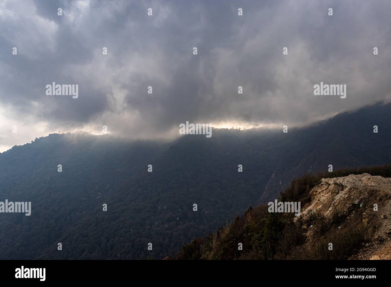 Overcast Rays mountain range with sun ray beams and heavy cloud overcast at day Stock ...