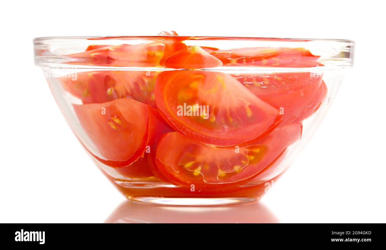 Diced tomatoes in glass bowl isolated on white Stock Photo Alamy