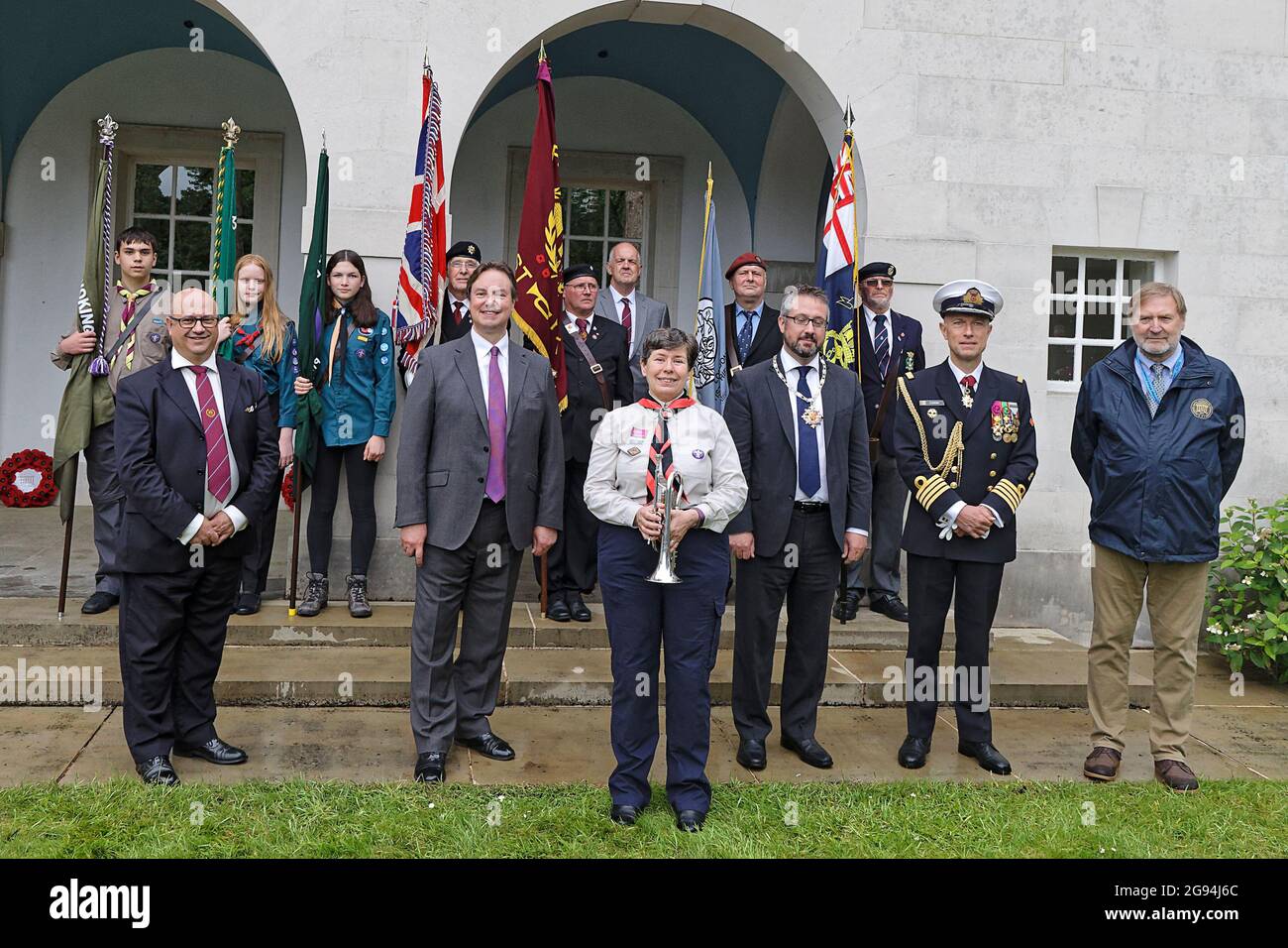 Front row left to right: Kevin Davis, Last Post Association; Jonathan Lord MP; Ruth Moore, Trumpeter; Cllr Liam Lyons, Woking Mayor; Captain Flamant, Defence Attache Belgian Embassy London & Angelo Munsel, American Military Cemetery Superintendent. Standard Bearers & Paul McCue of the Secret WW2 Learning Network in the background. 80th Anniversary Service of Brookwood Last Post Association. Stock Photo