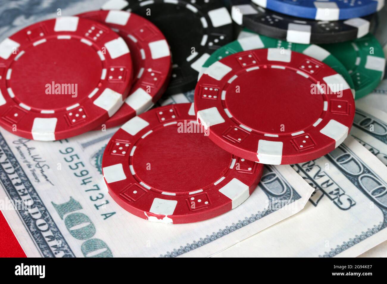 poker chips with dollars closeup Stock Photo Alamy