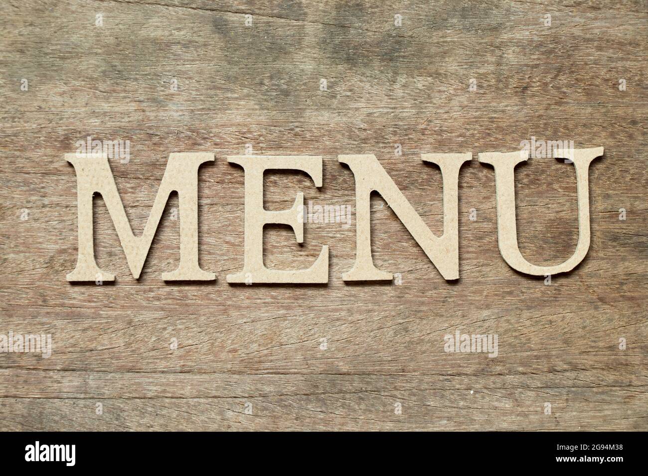 English alphabet in word menu on wood background Stock Photo - Alamy