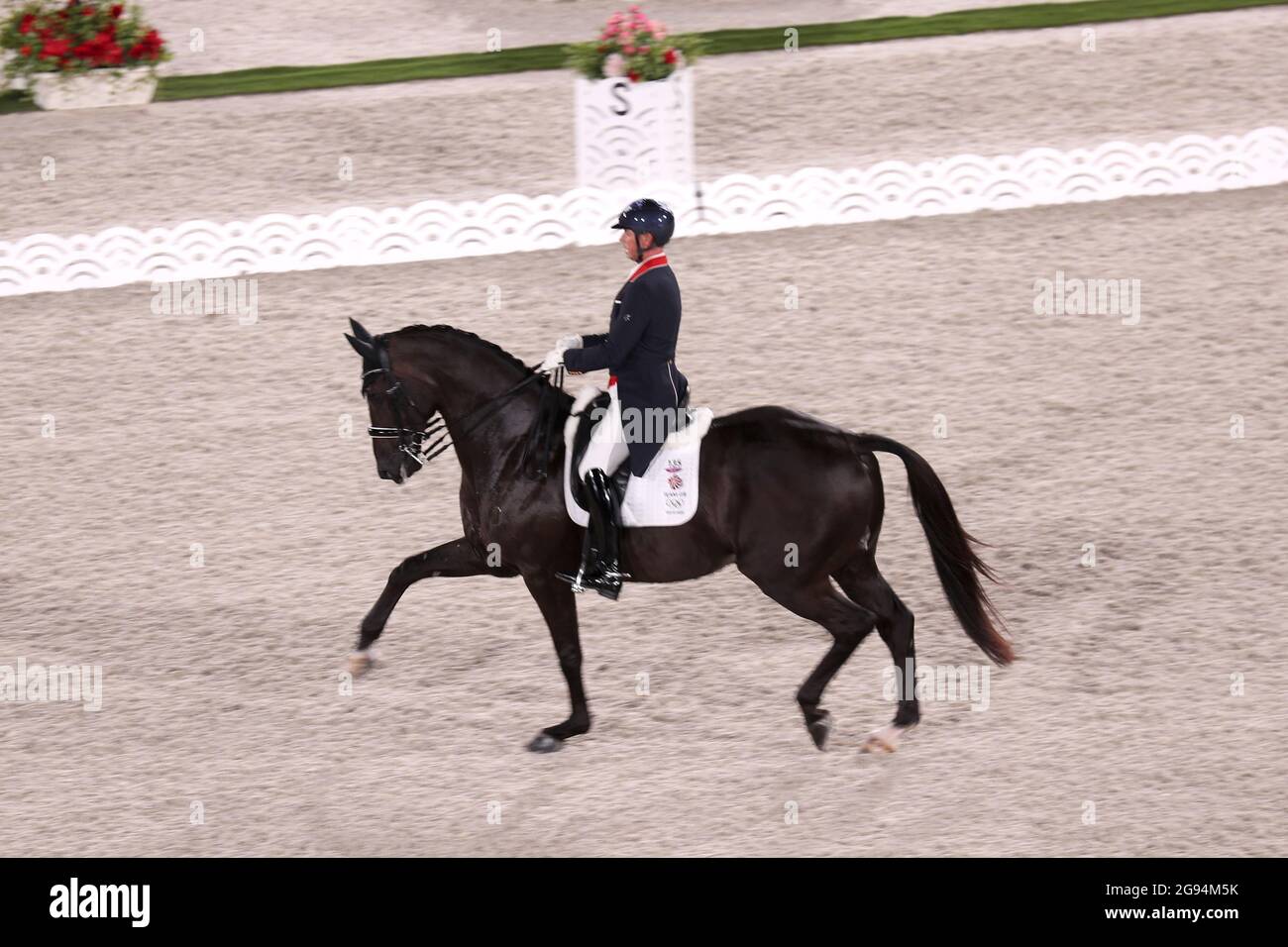 Tokio, Japan. 24th July, 2021. Equestrian sport/dressage: Olympia, preliminary competition, individual, Grand Prix, at the Baji Koen Equestrian Park. Carl Hester from Great Britain rides the horse En Vogue. Credit: Friso Gentsch/dpa/Alamy Live News Stock Photo