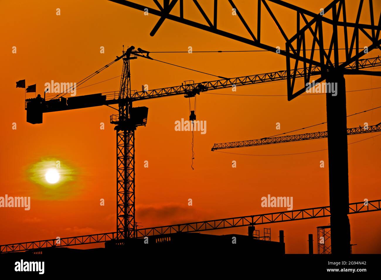 Colorful sky at construction site Stock Photo - Alamy