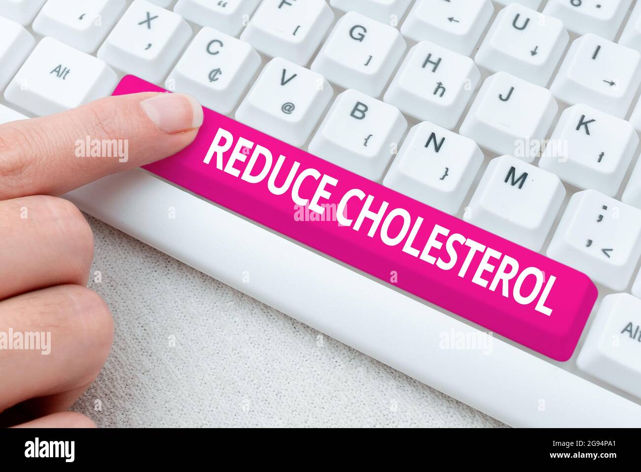 Sign displaying Reduce Cholesterol. Business concept lessen the intake of saturated fats in the diet Typing Difficult Program Codes, Writing New Stock Photo