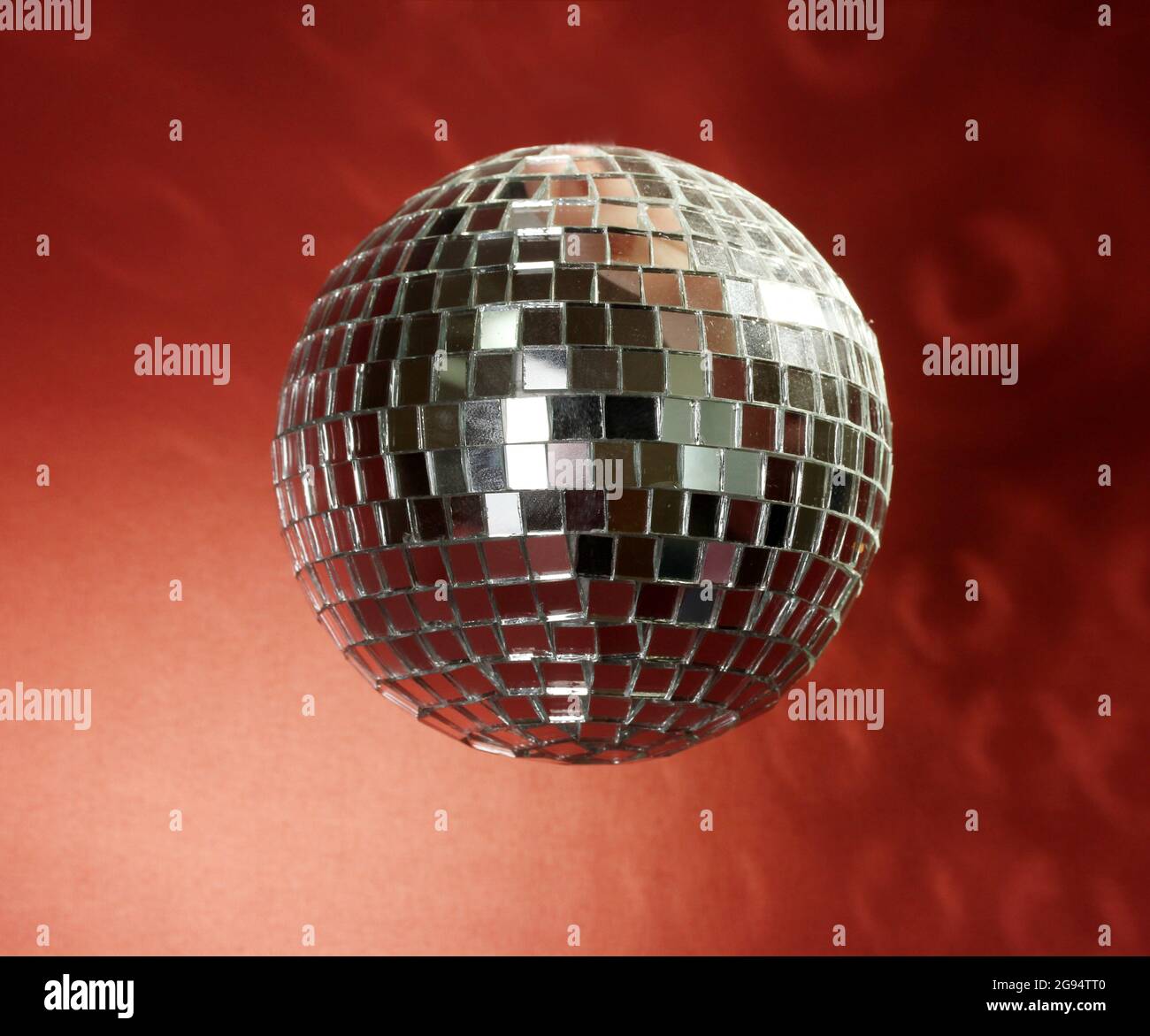 disco ball on red background Stock Photo Alamy