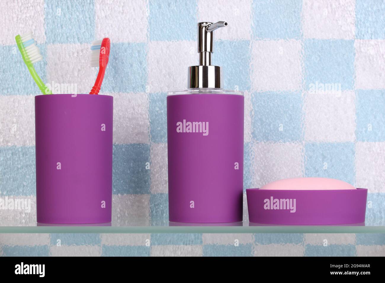 Bath accessories on shelf in bathroom Stock Photo Alamy