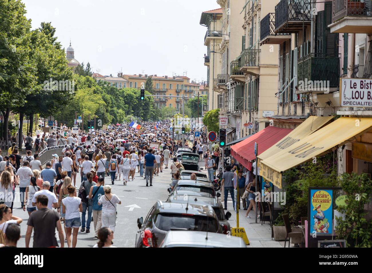 Thousands of demonstrators march through the streets of Nice to protest against the health pass, on July 24, 2021, in Nice, France. Since July 21, people wanting to go to in most public spaces in France have to show a proof of Covid-19 vaccination or a negative test, as the country braces for a feared spike in cases from the highly transmissible Covid-19 Delta variant. Photo by Lucie Choquet/ABACAPRESS.COM Stock Photo