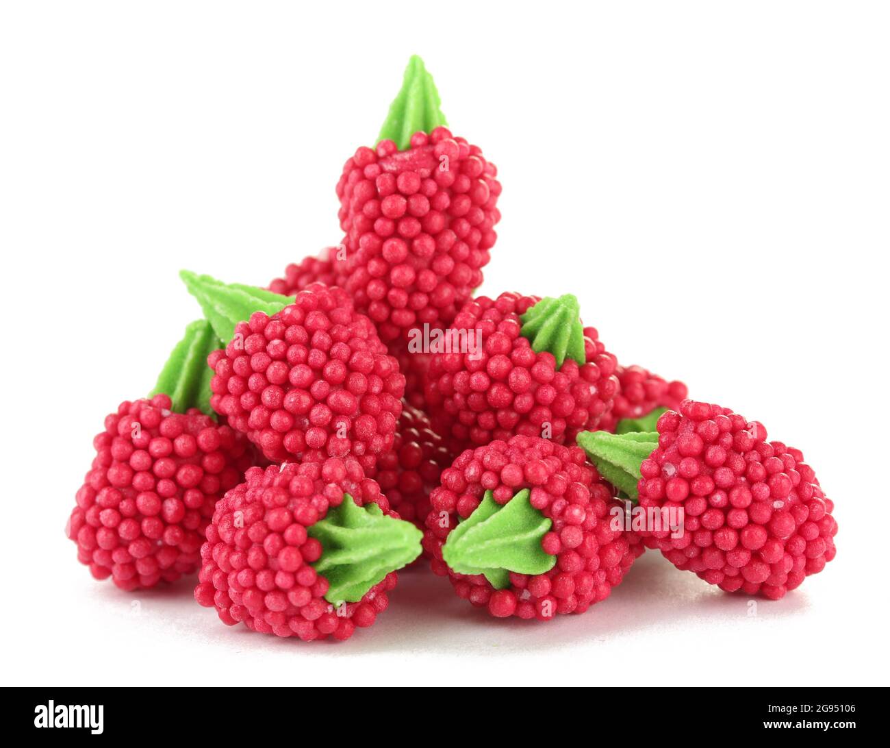 red candy raspberries isolated on white Stock Photo - Alamy