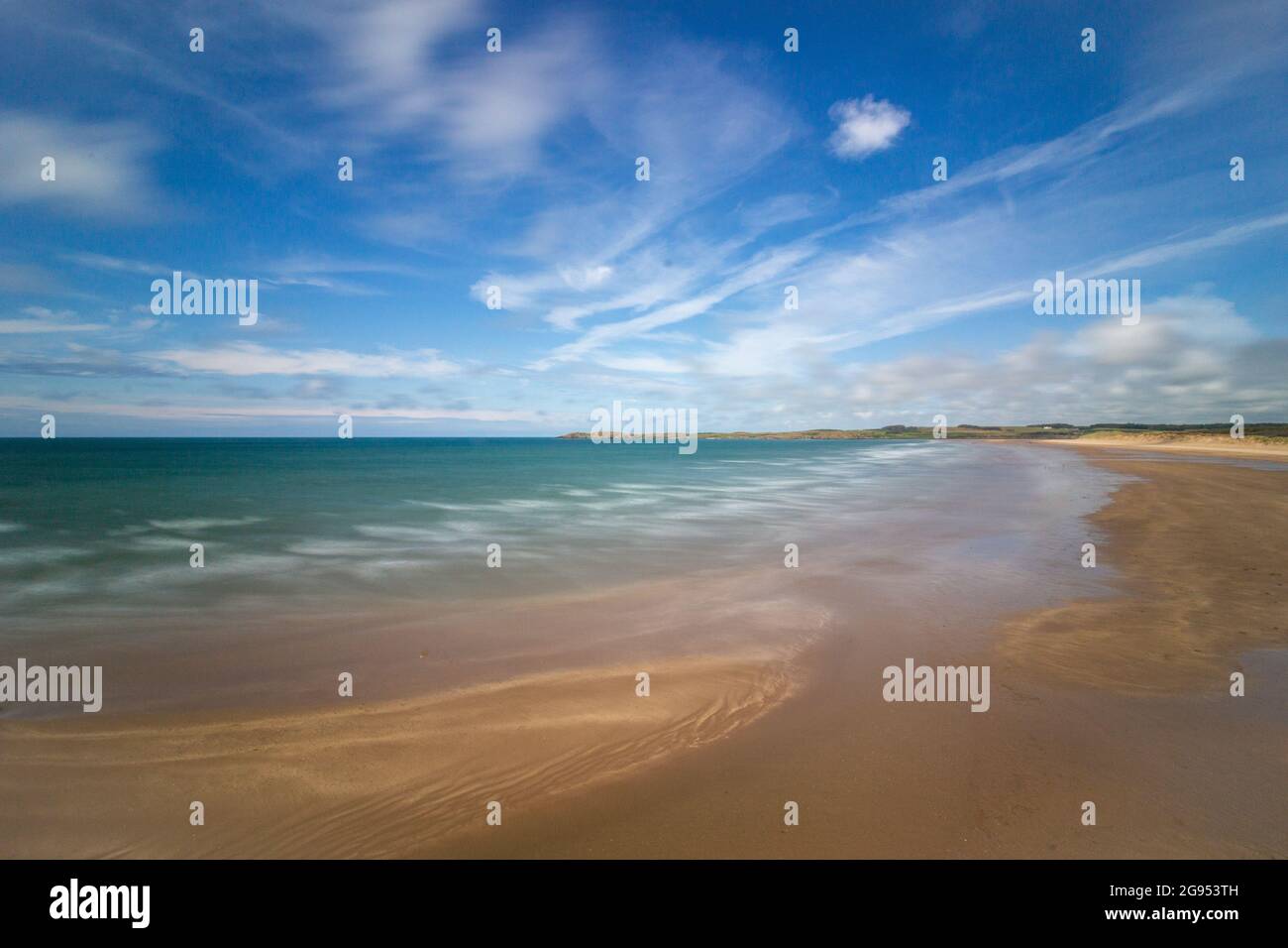 Looking Across Llanddwyn Bay Beach On The Island Of Angelsey Stock Photo