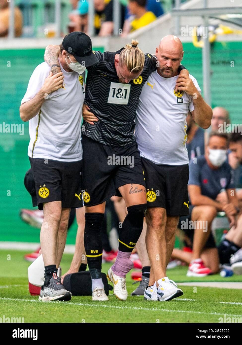 St. Gallen, Switzerland. 24th July, 2021. Football: Bundesliga, Test  matches, Borussia Dortmund - Athletic Bilbao at Kybunpark. Dortmund's  Marius Wolf is substituted with an injury. Credit: David Inderlied/dpa -  IMPORTANT NOTE: In