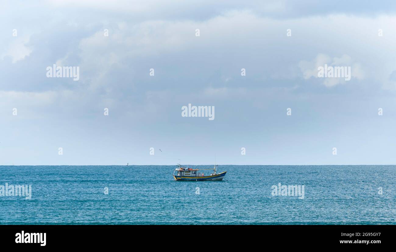 Fisherman boat alone at sea in Brazil Stock Photo