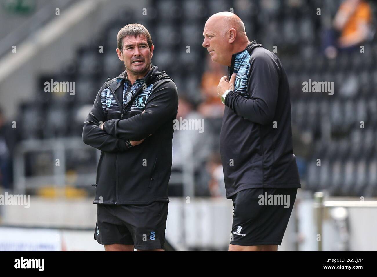 Mansfield Town manager Nigel Clough and First team coach Andy Garner in discussion during the match in, on 7/24/2021. (Photo by David Greaves/News Images/Sipa USA) Credit: Sipa USA/Alamy Live News Stock Photo