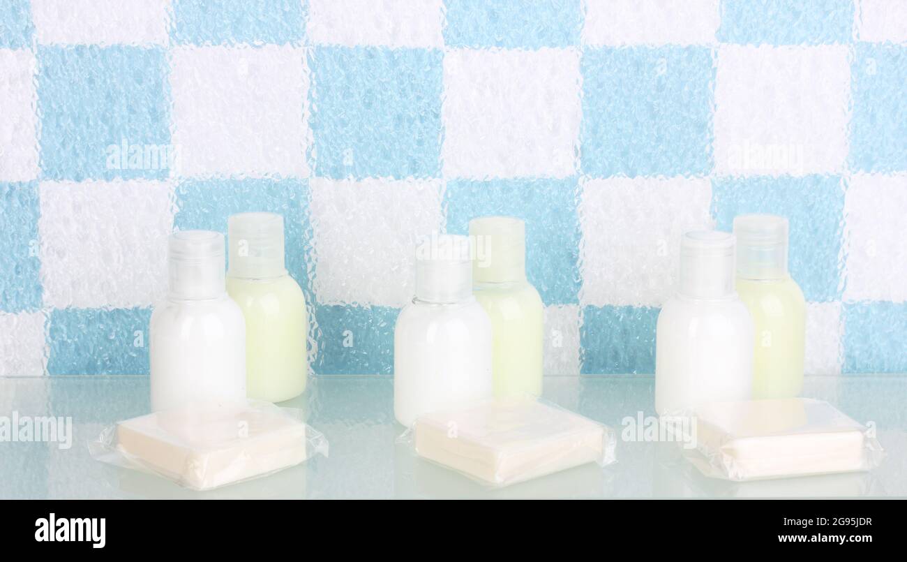 Hotel amenities kit on shelf in bathroom Stock Photo - Alamy