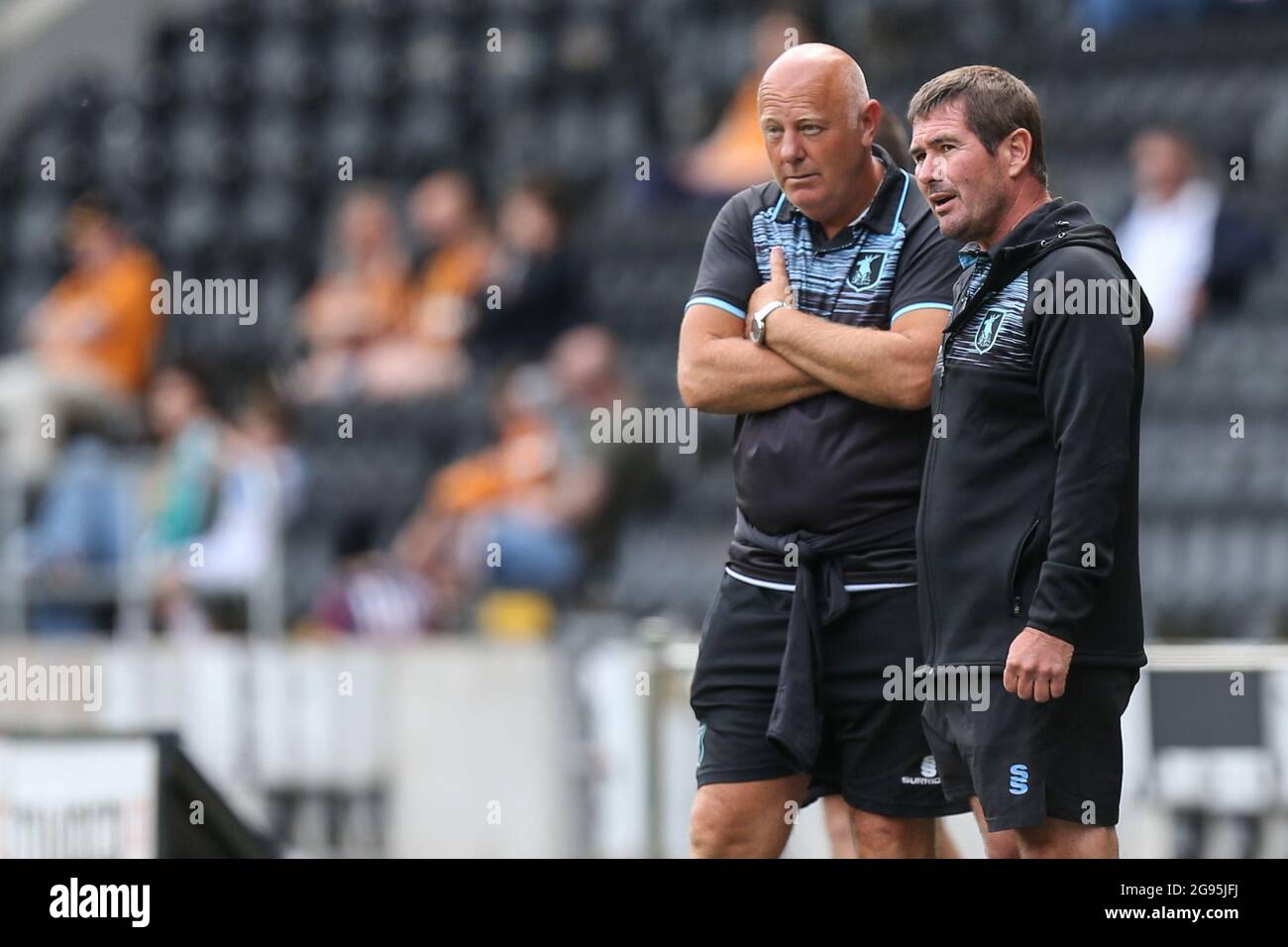 Mansfield Town manager Nigel Clough and First team coach Andy Garner in discussion during the match in, on 7/24/2021. (Photo by David Greaves/News Images/Sipa USA) Credit: Sipa USA/Alamy Live News Stock Photo