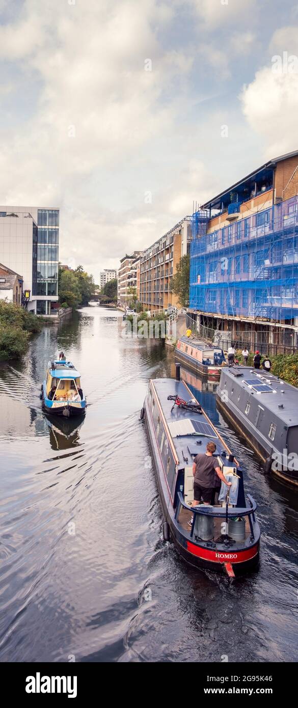 Barges passing on the regents canal in Shoreditch, East London, UK. Stock Photo