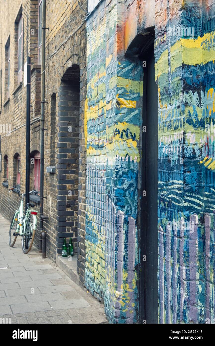 Colourful wall art in trendy Shoreditch, London, UK. Stock Photo