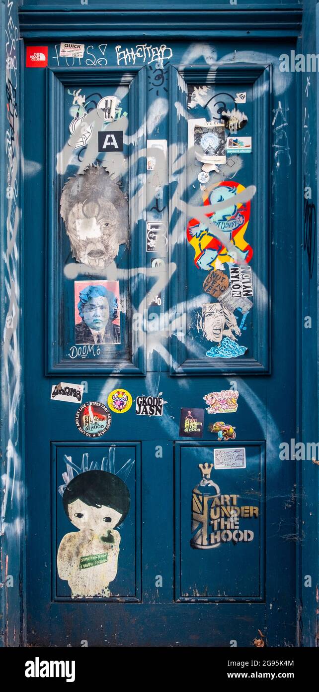 A grungy image of a defaced door in Shoreditch, East London, UK. Stock Photo