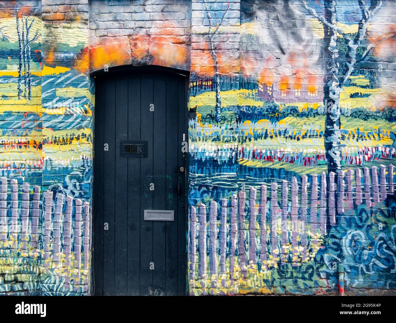Colourful wall art in trendy Shoreditch, London, UK. Stock Photo