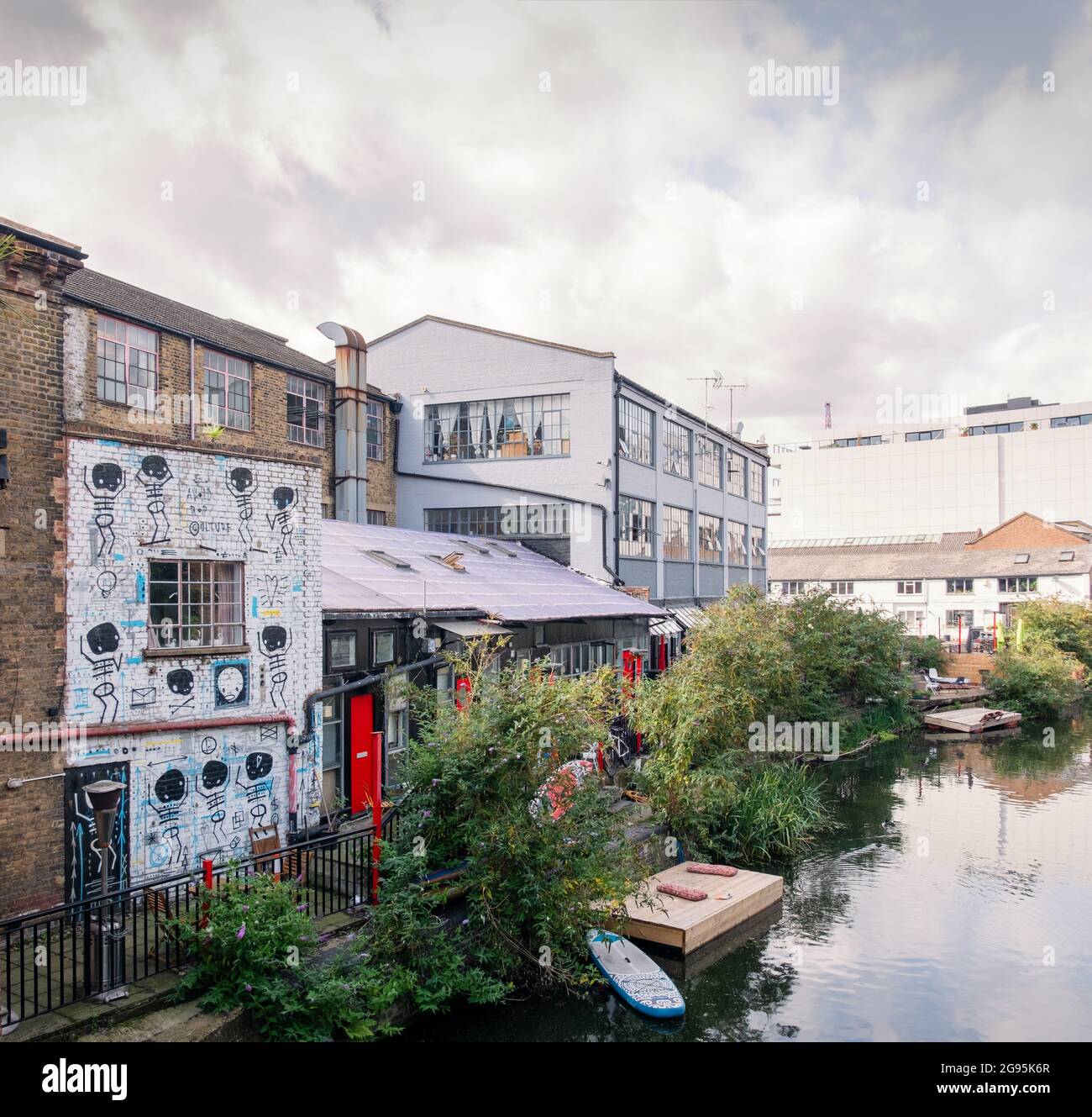 A view of Regents Canal and towpath, Shoreditch, East London, UK. Stock Photo