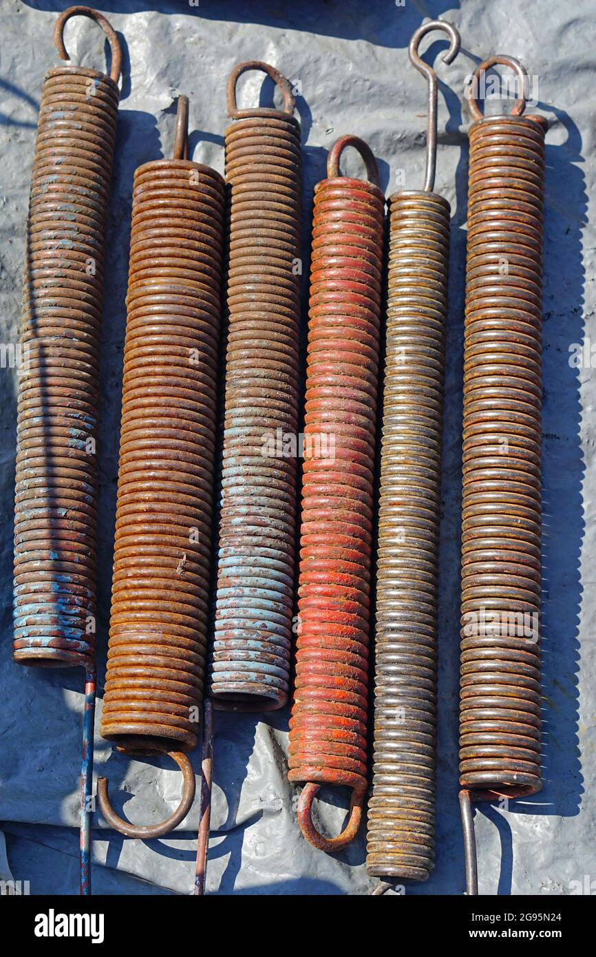 Big used metal springs coils old and rusty Stock Photo Alamy