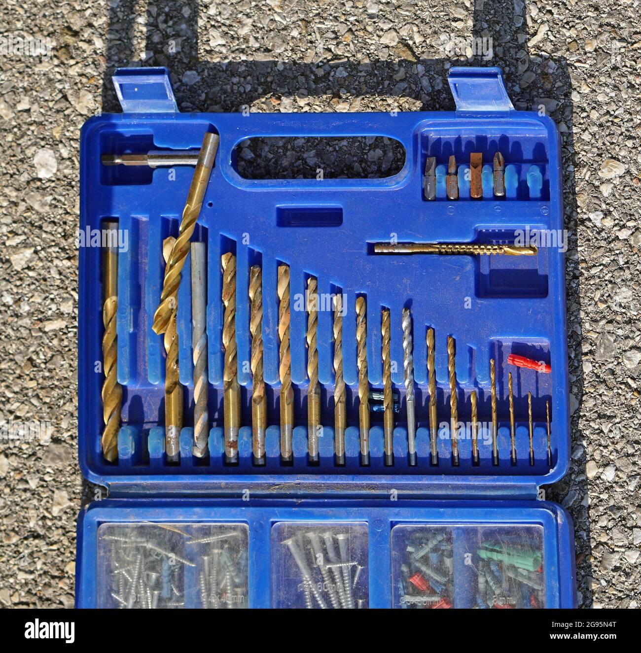 Drills bits tool set in blue plastic box Stock Photo Alamy