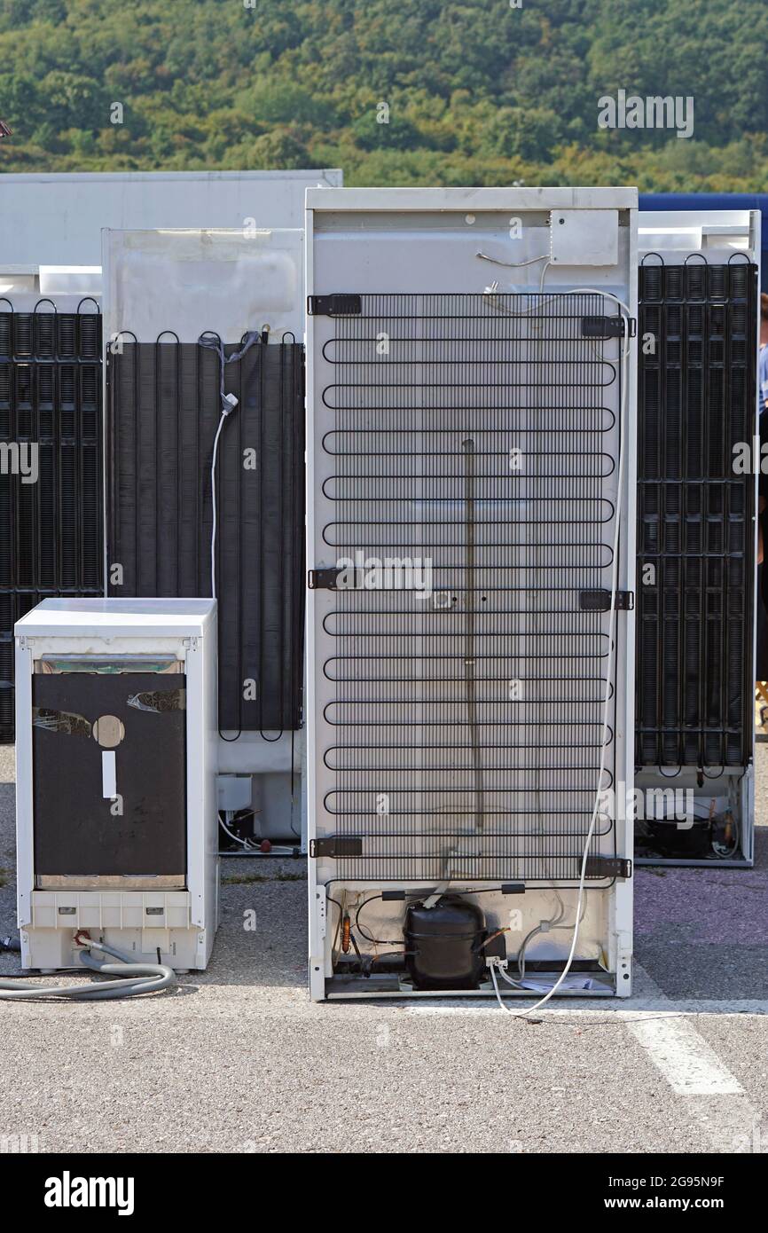 Recycling old refrigerators and home appliances outside Stock Photo Alamy