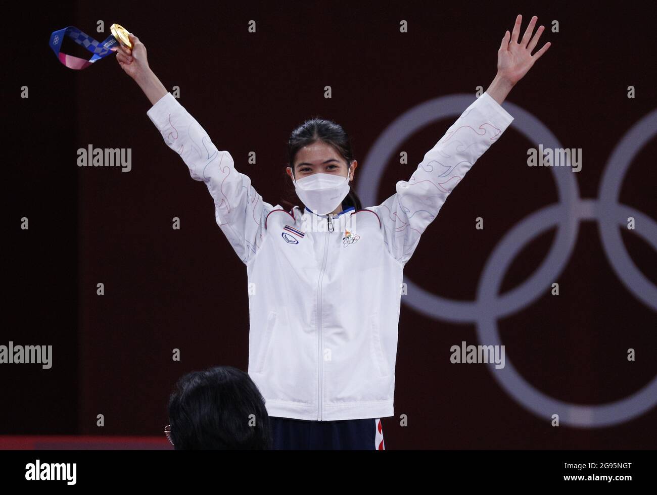 Tokyo, Japan. 24th July, 2021. Thailand's Panipak Wongpattanakit waves after wining the gold medal in Women's 49kg Taekwondo at the Tokyo Summer Olympic Games in Tokyo, Japan, on Saturday, July 24, 2021. Photo by Bob Strong/UPI. Credit: UPI/Alamy Live News Stock Photo