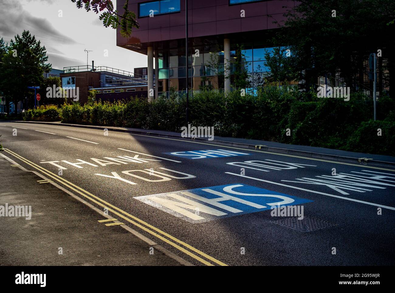 Thank you NHS signs on painted in the the road outside of Southampton General hospital Hampshire England. Stock Photo