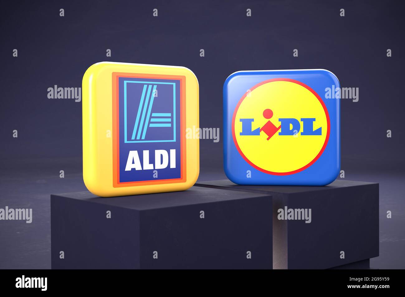 Aldi vs Lidl concept: logos of the two competing discount super markets standing on two pedestals. Stock Photo