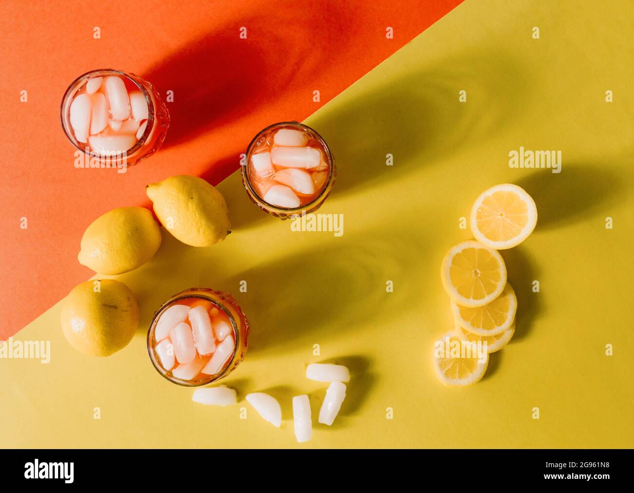 Flatlay of lemonade with vibrant background colours Stock Photo
