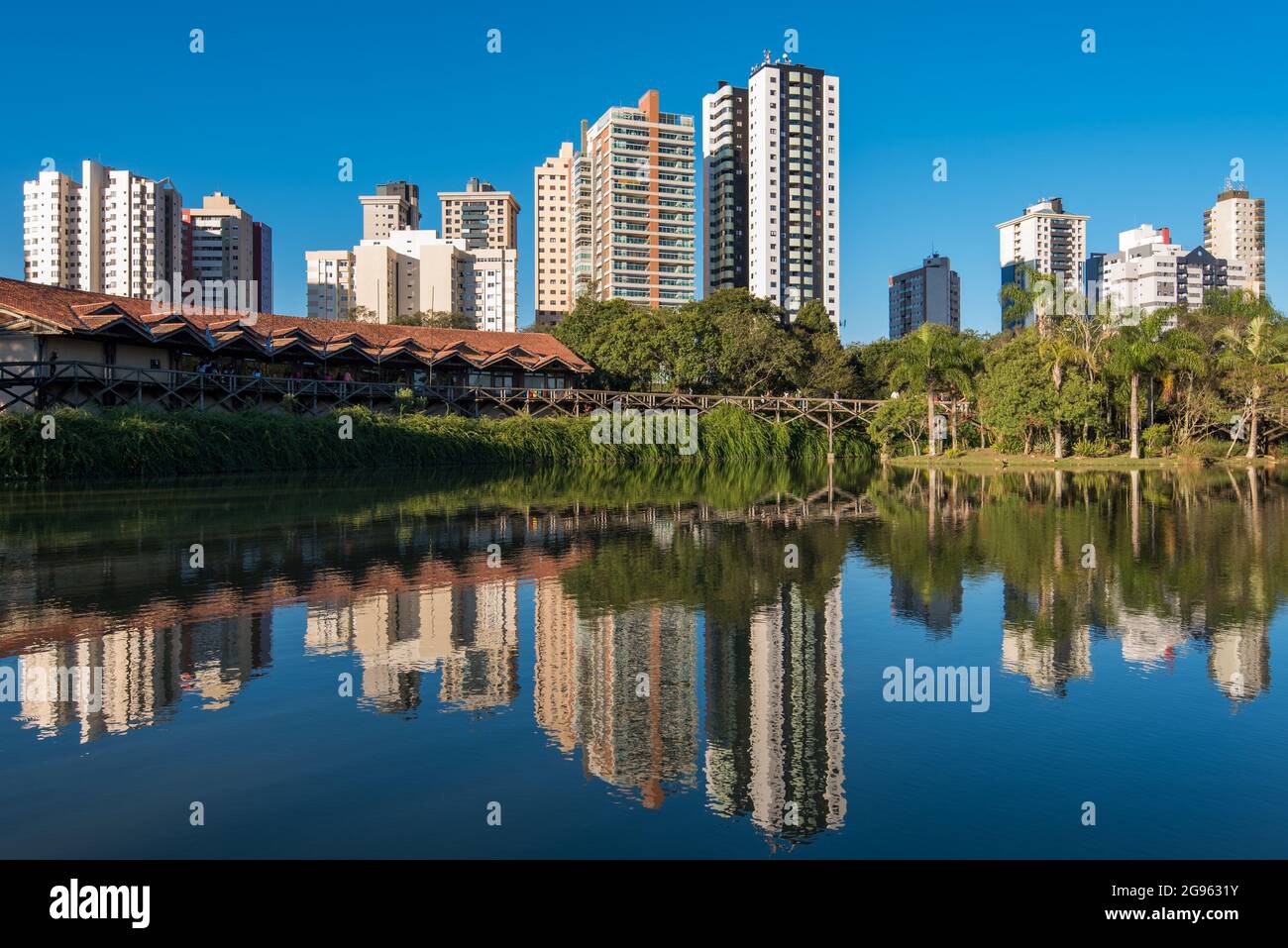 Apartment Buildings Reflected in Water of the Public Park in Curitiba City, Brazil Stock Photo