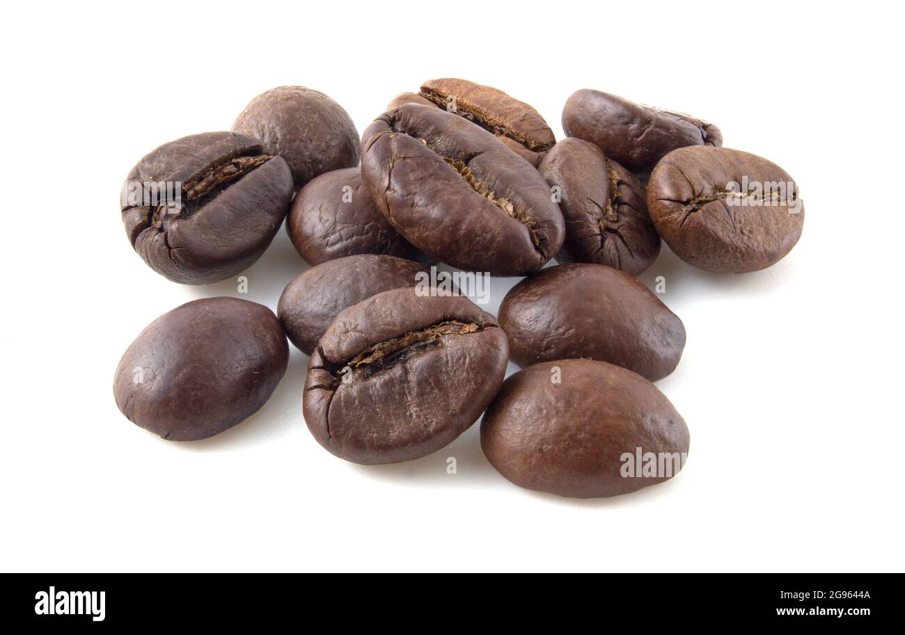 Roasted coffee beans close up isolated on white background Stock Photo ...