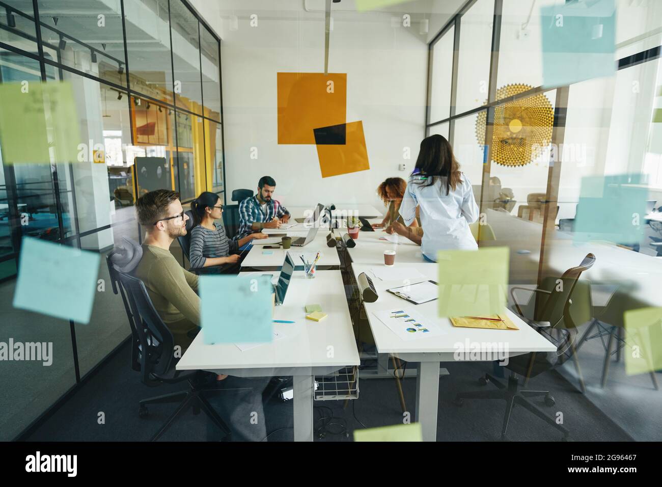 Hard-working young people working at modern office Stock Photo