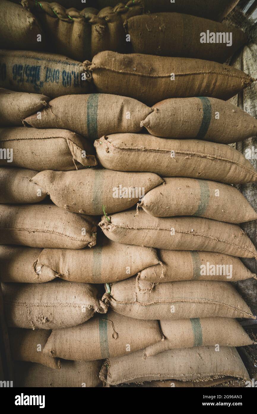Sacks full of rice in a factory Stock Photo - Alamy