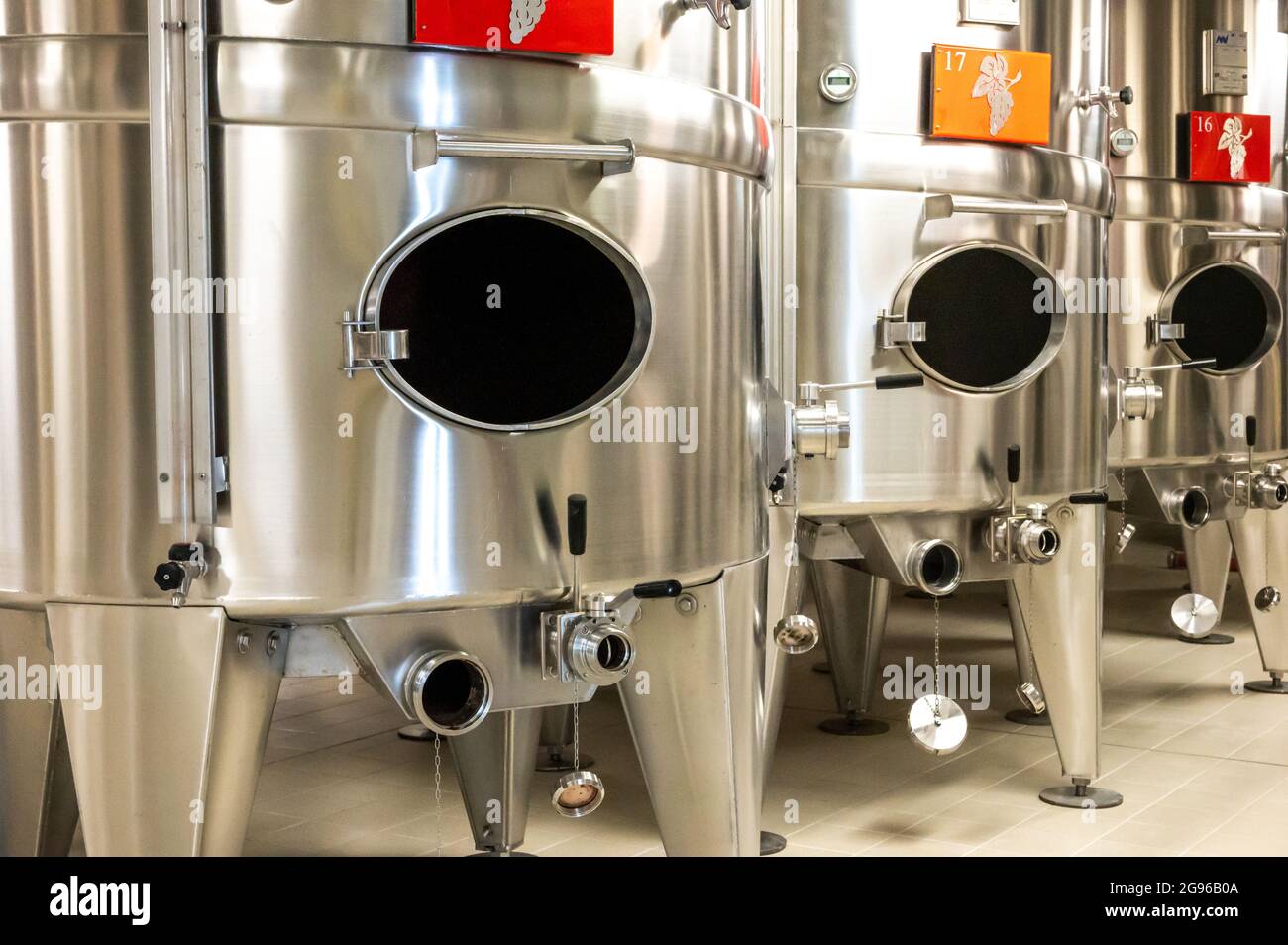 Traditional champagne sparkling wine making process in steel tanks in