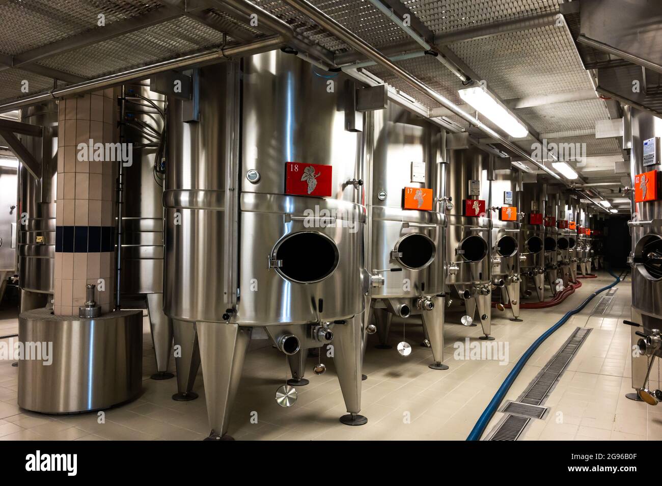 Traditional champagne sparkling wine making process in steel tanks in
