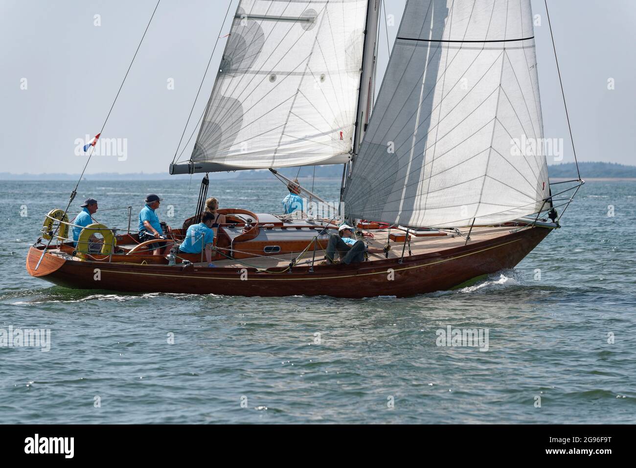 Sunmaid V a traditional wooden sailing yacht built in Cowes in 1967 enjoying racing in some light winds during the Cowes Classic Reggata Stock Photo