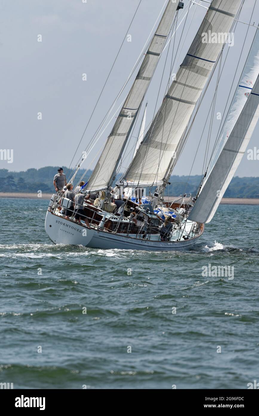 Stormvogel a superb large wooden  racing and charter yacht enjoying a balmy day's racing at the Cowes Classic Regatta Stock Photo