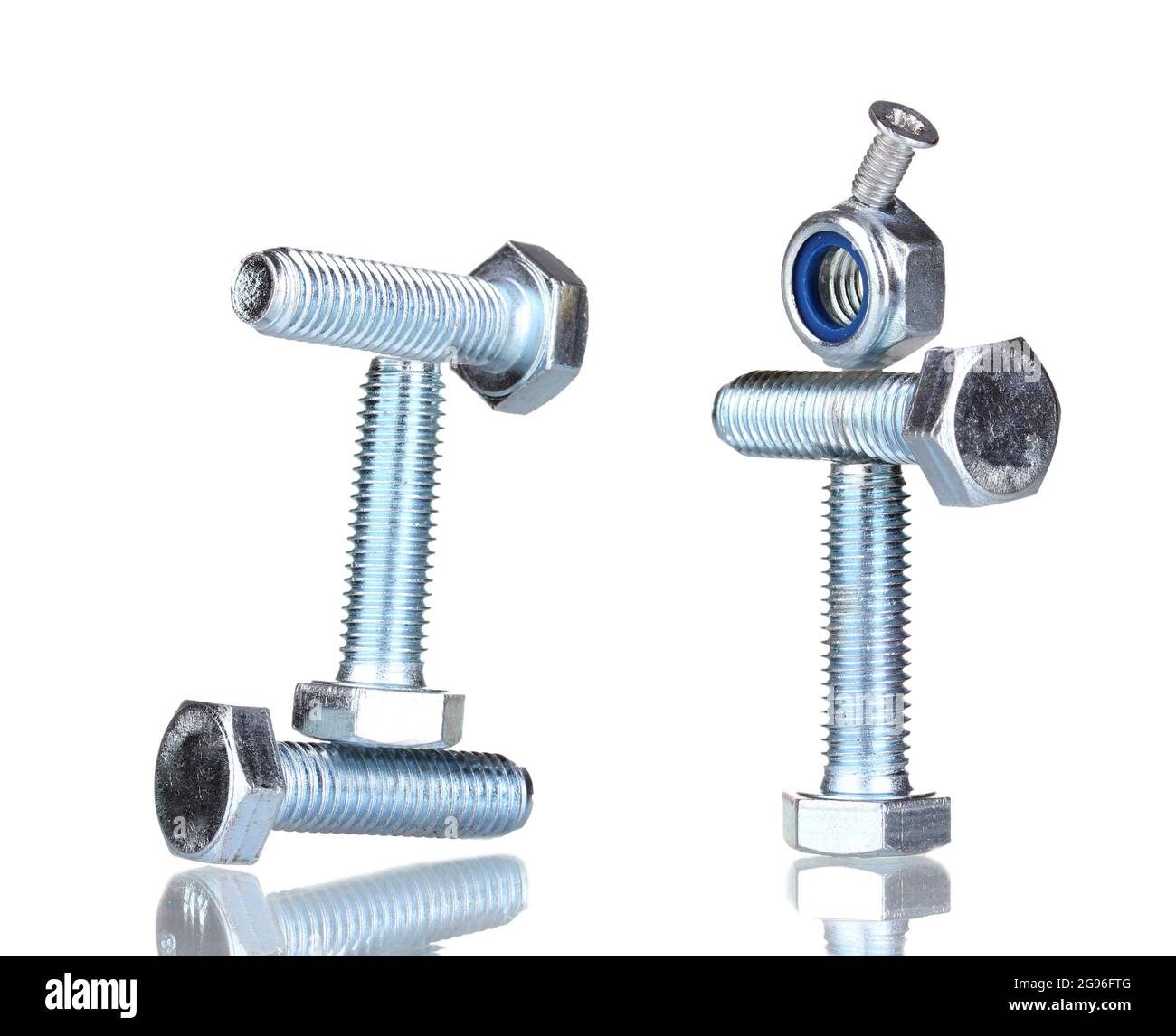 Stacks of balanced screws isolated on white Stock Photo Alamy