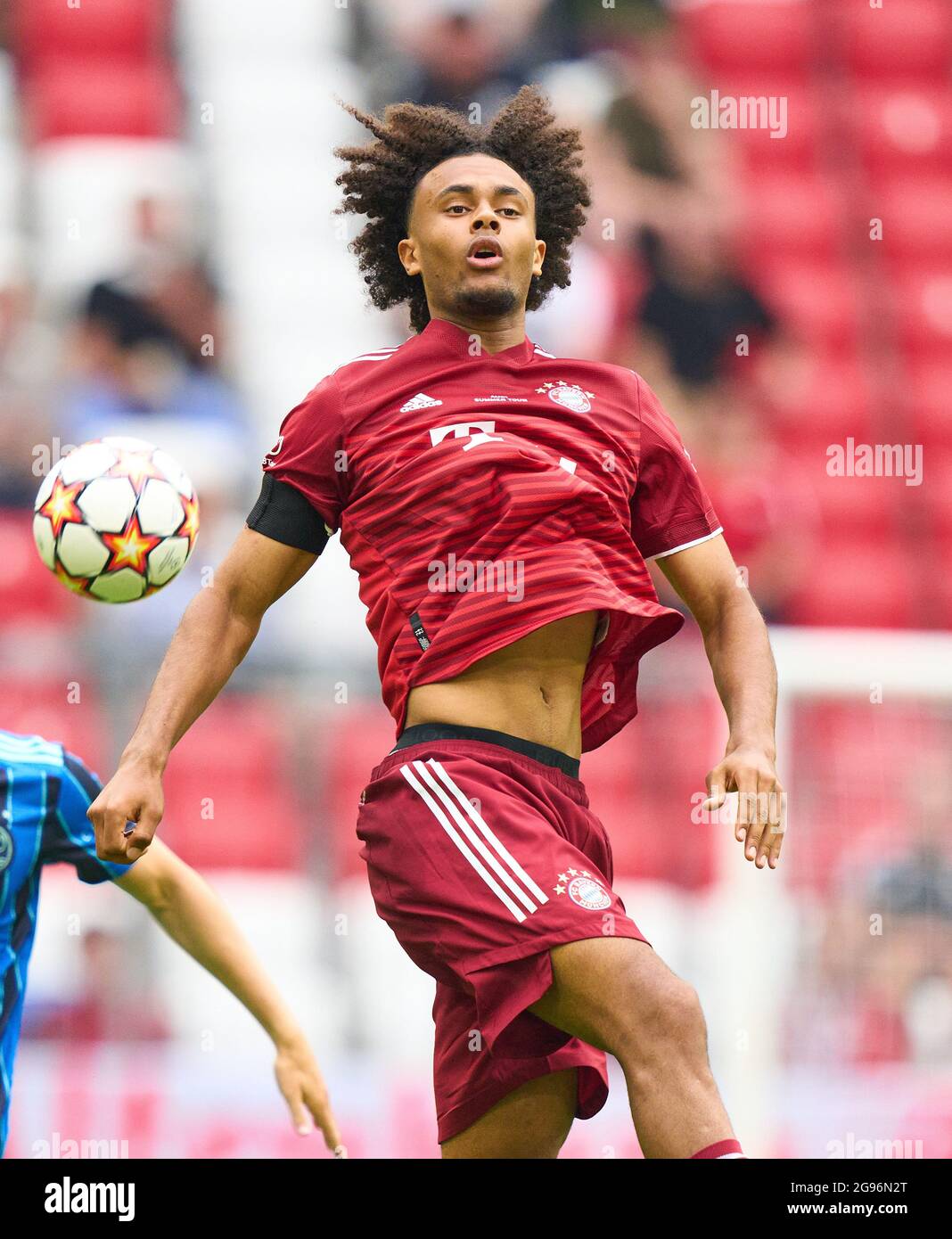 Joshua ZIRKZEE, FCB 14  half-size, portrait, one person, single, Aktion, Einzelbild, angeschnittenes Einzelmotiv, Halbfigur, halbe Figur,  in the match FC BAYERN MUENCHEN - AJAX AMSTERDAM 2-2 at the Audi Football Summit on July 24, 2021 in Munich, Germany  Season 2021/2022, matchday X, 1.Bundesliga, FCB, München, X.Spieltag. © Peter Schatz / Alamy Live News Stock Photo