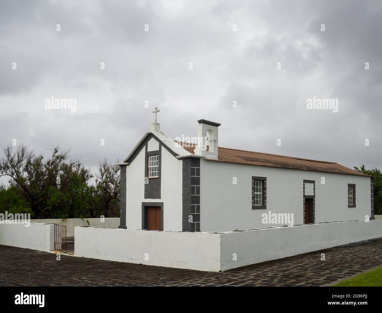 Small chapel in white and lava stone, Graciosa Island Stock Photo
