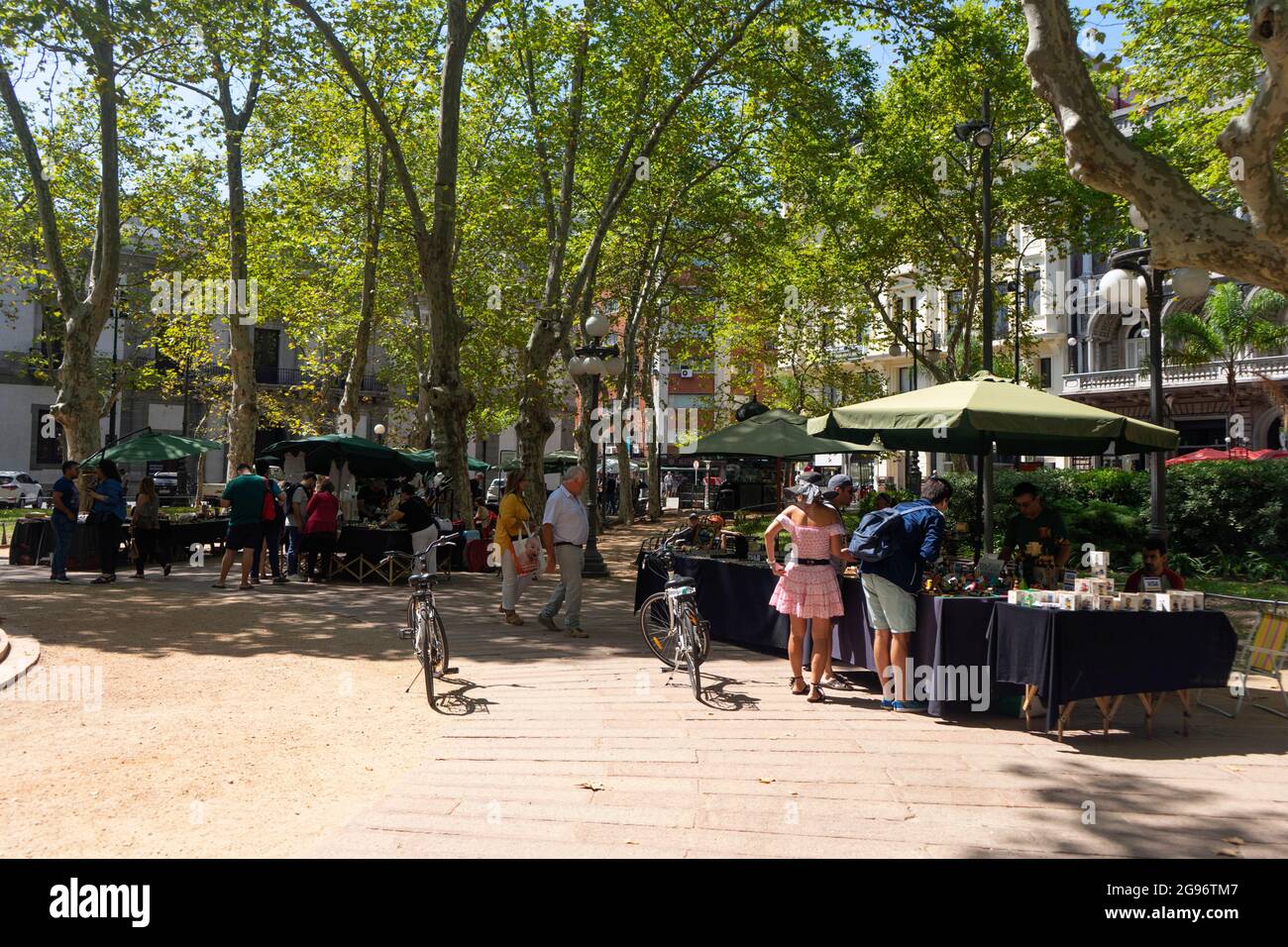Open-air fair with seller of antique pieces in the Plaza de la Constitution Montevideo Uruguay . Stock Photo