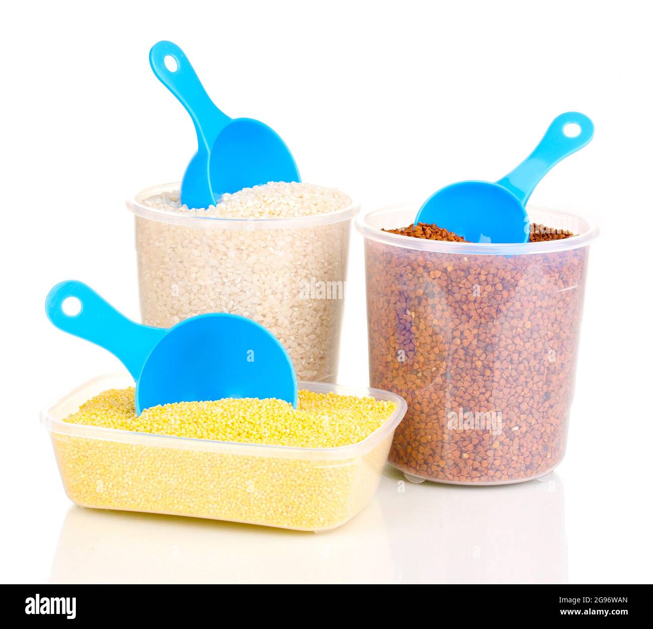 Measuring spoons and plastic containers with grain isolated on white ...